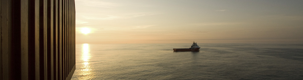 Seismic research vessel at sunset